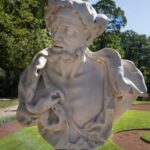 Image showcasing sustainable gardening practices in a beautifully landscaped garden with organic soil and compost