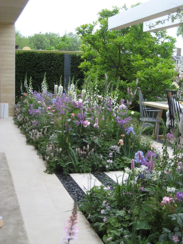 Wisteria Landscaping Ideas 1 Wisteria-covered pergola over stone pathway: Stunning landscaping ideas