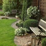 Design herb garden layout with raised beds, companion planting, and accessible pathways for easy harvesting