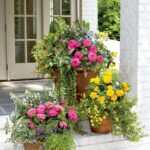 Explore creative garden design layouts incorporating natural elements for a sustainable outdoor space