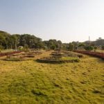 Small shady garden design with lush greenery and pops of color, ideal garden design ideas