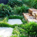 Gardening on a Hill Ideas Maximizing space with tiered planters and cascading flowers